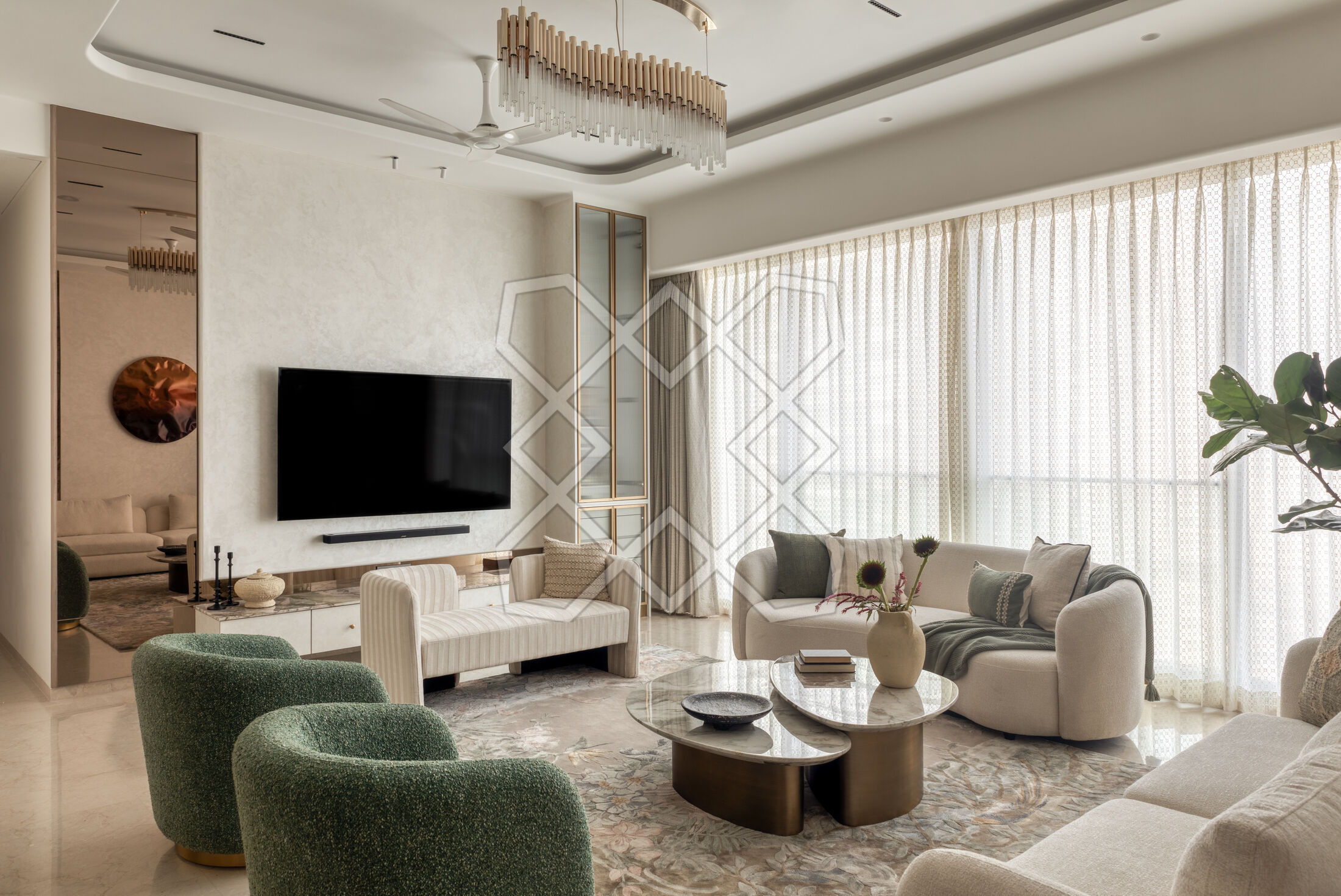 The living room at Renaissance, with its revolving green accent chairs
