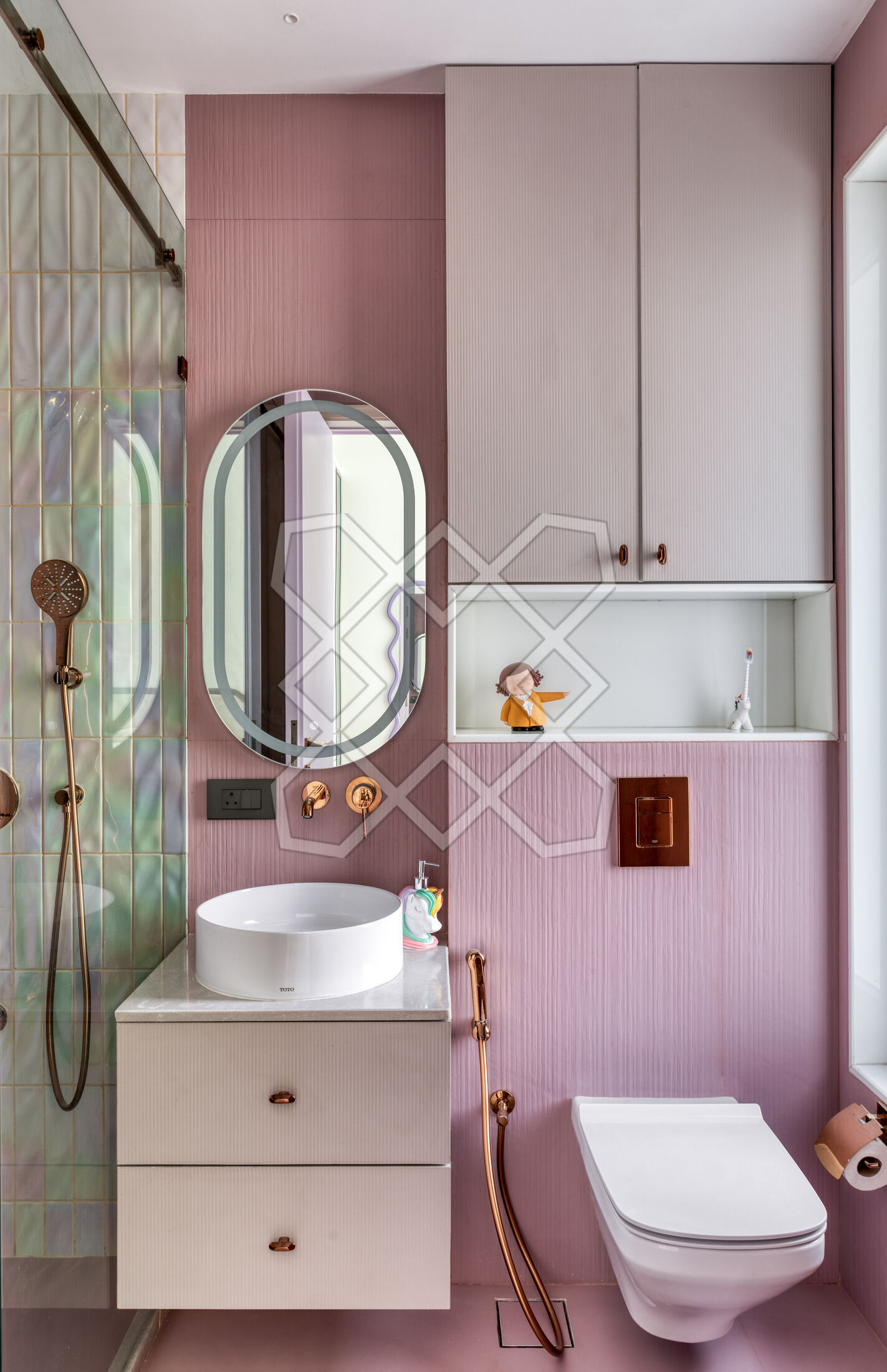 The peach-pink bathroom at Renaissance, with its handmade tiles