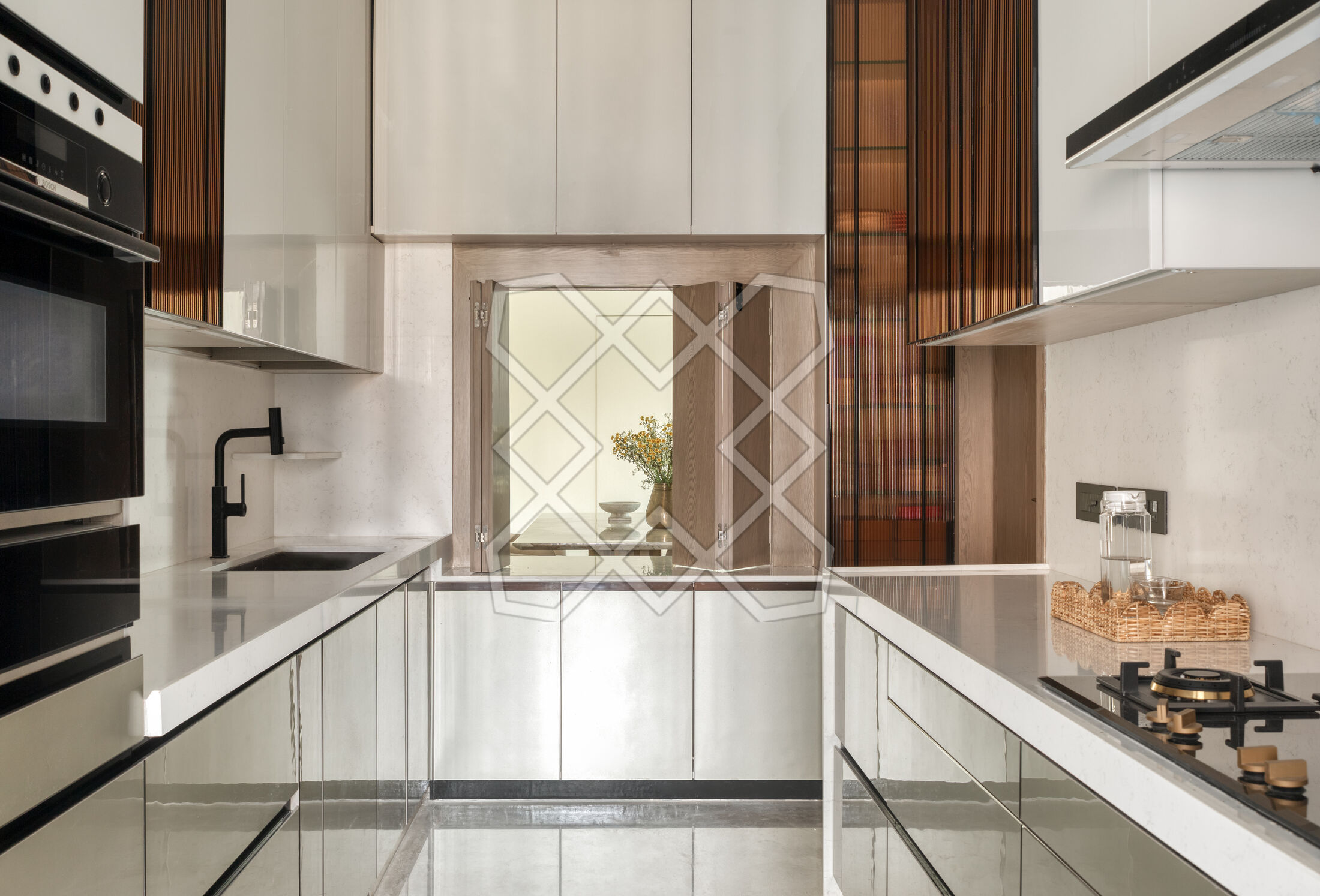 The kitchen at Renaissance, in silver-toned metallic glass