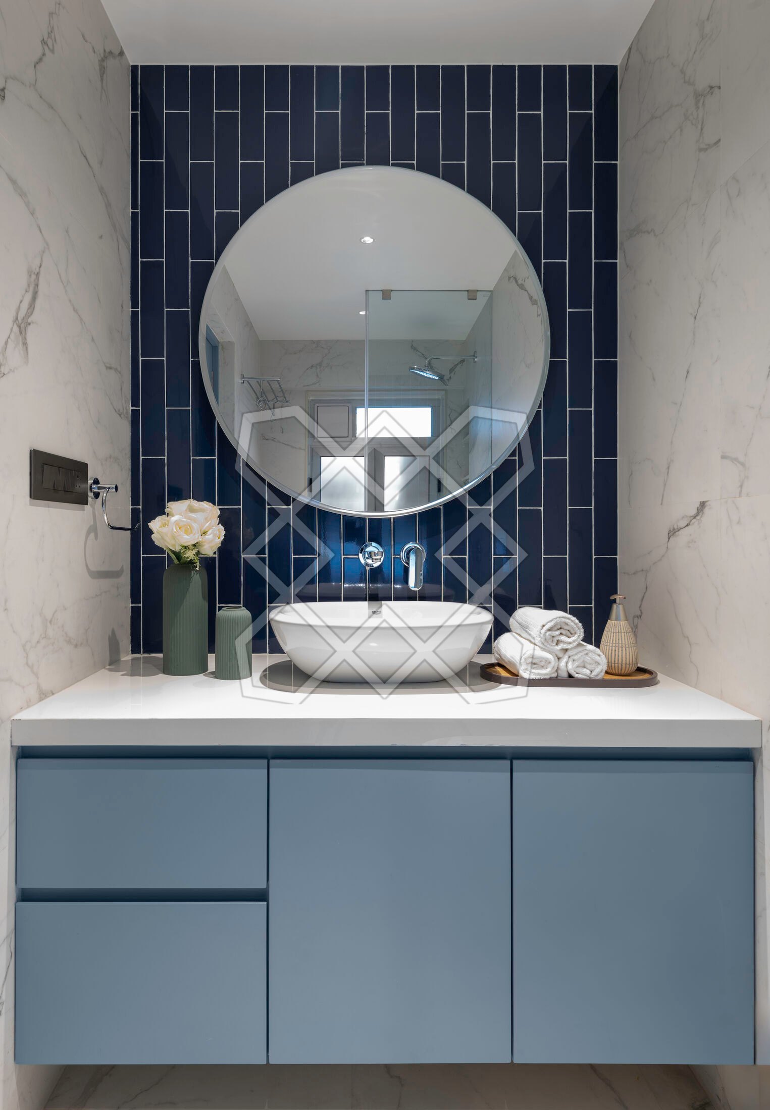 The guest bathroom at the Juhu apartment, in White Statuario marble