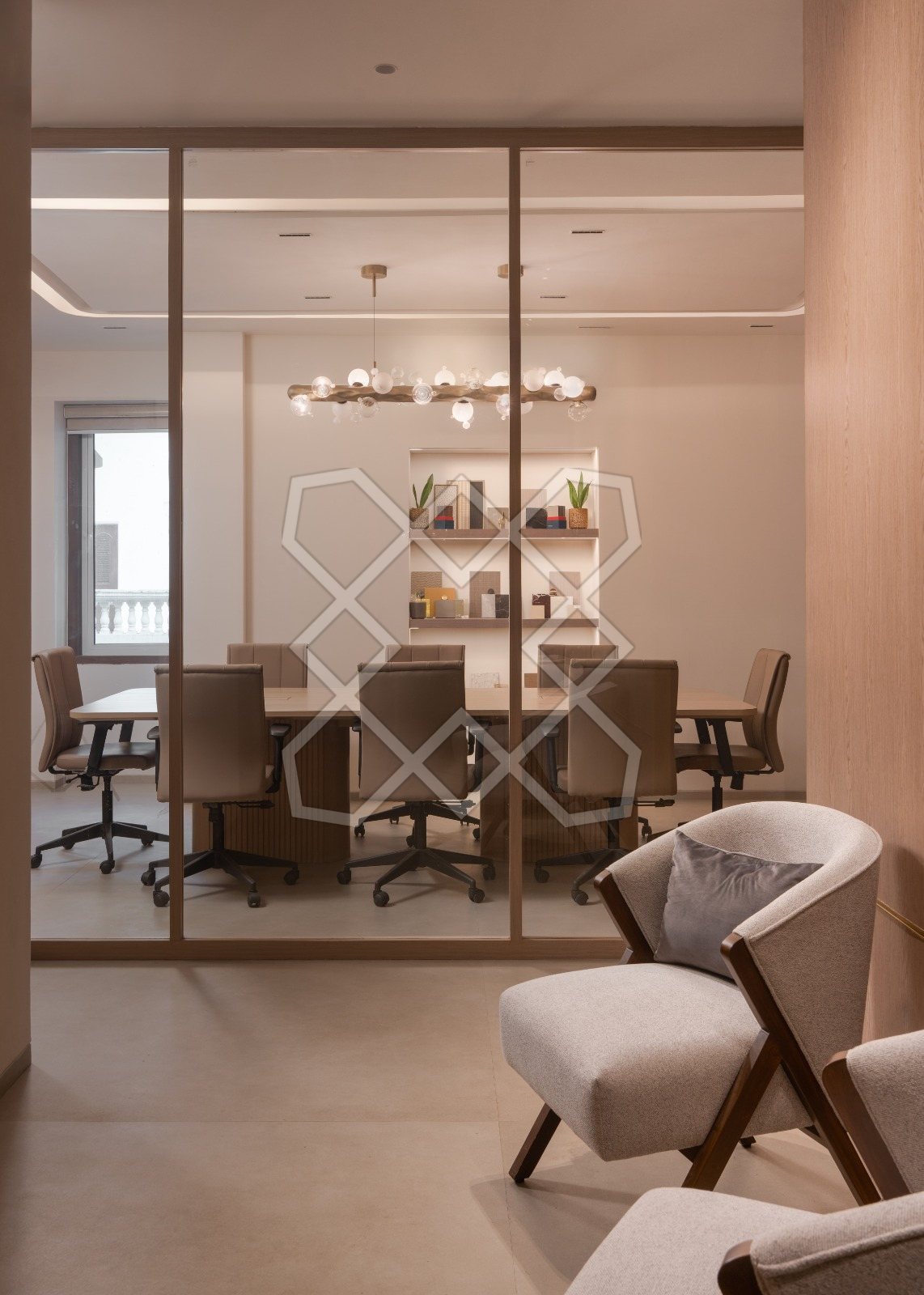 The meeting room at The Genesis, behind its glass and timber partition