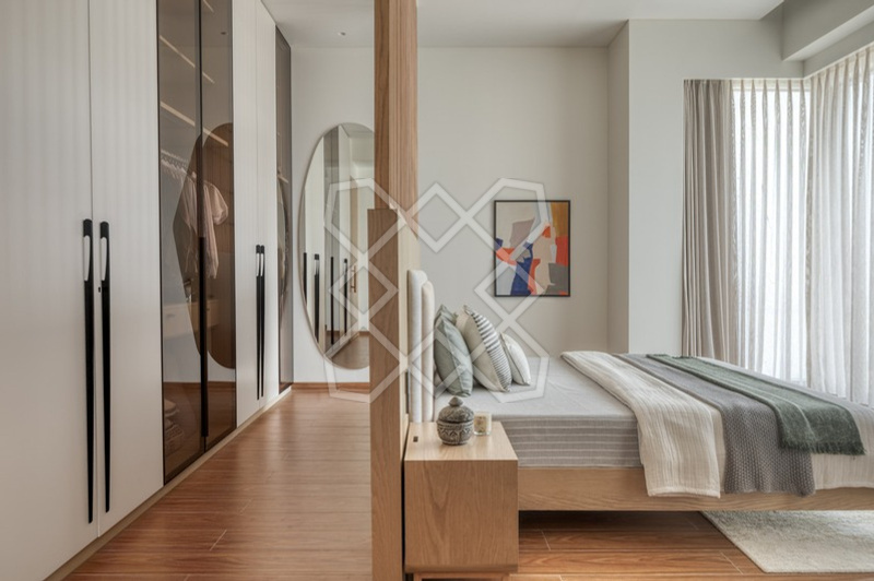 Mirrored wardrobe joinery in a bedroom at Orion