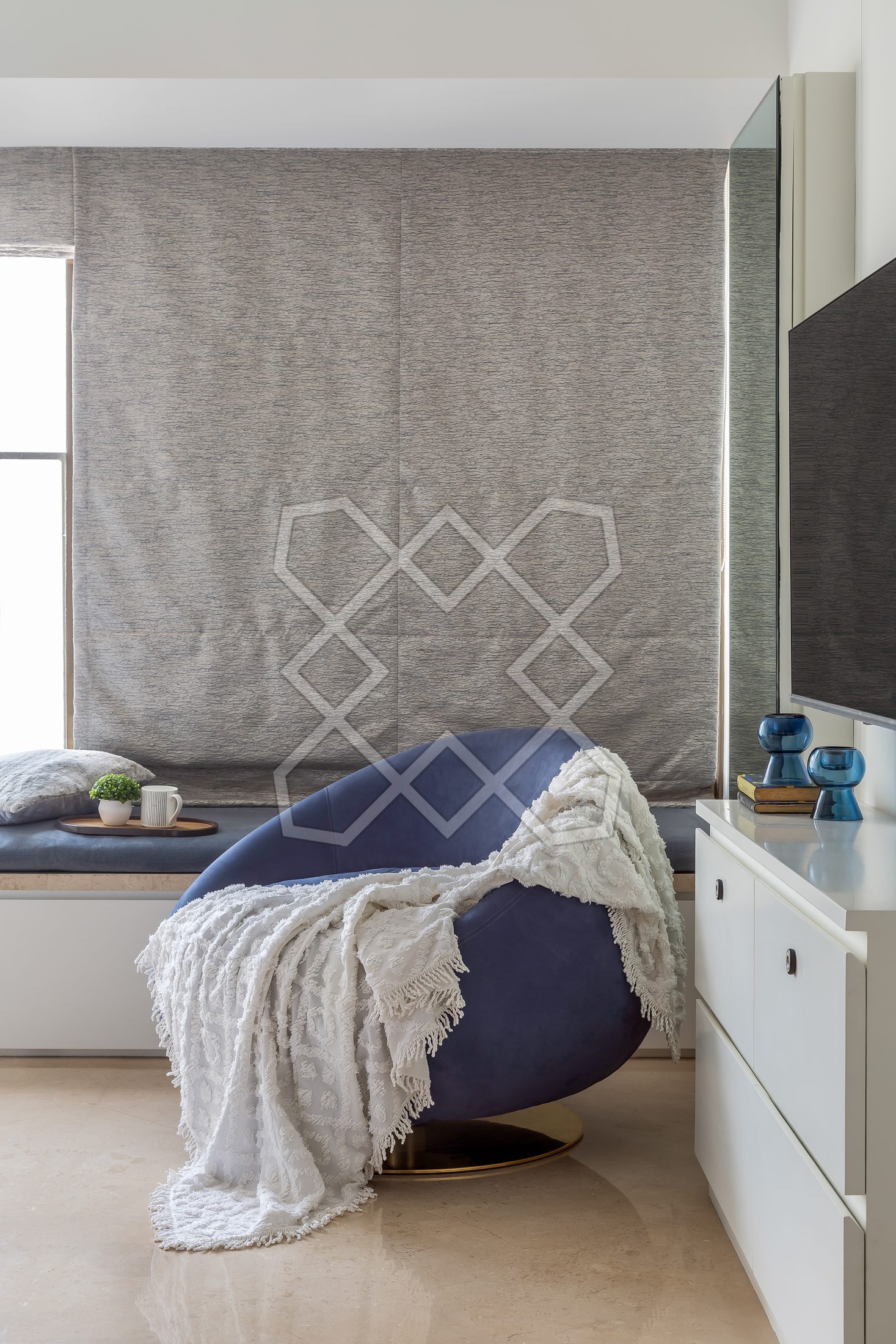 The window seat and lounge chair in a bedroom at The Eternal Solace