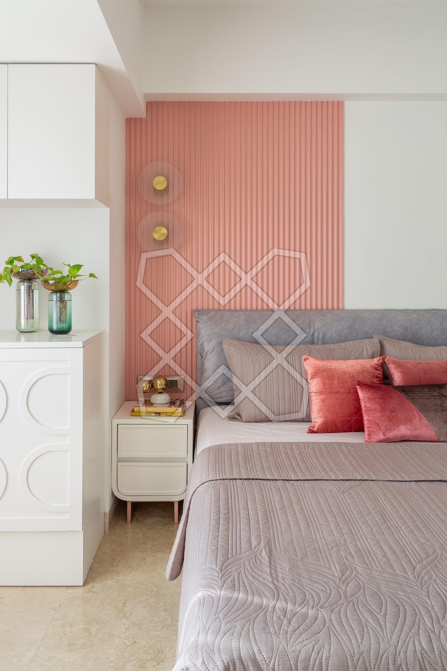 The fluted blush panel behind the bed in a bedroom at The Eternal Solace
