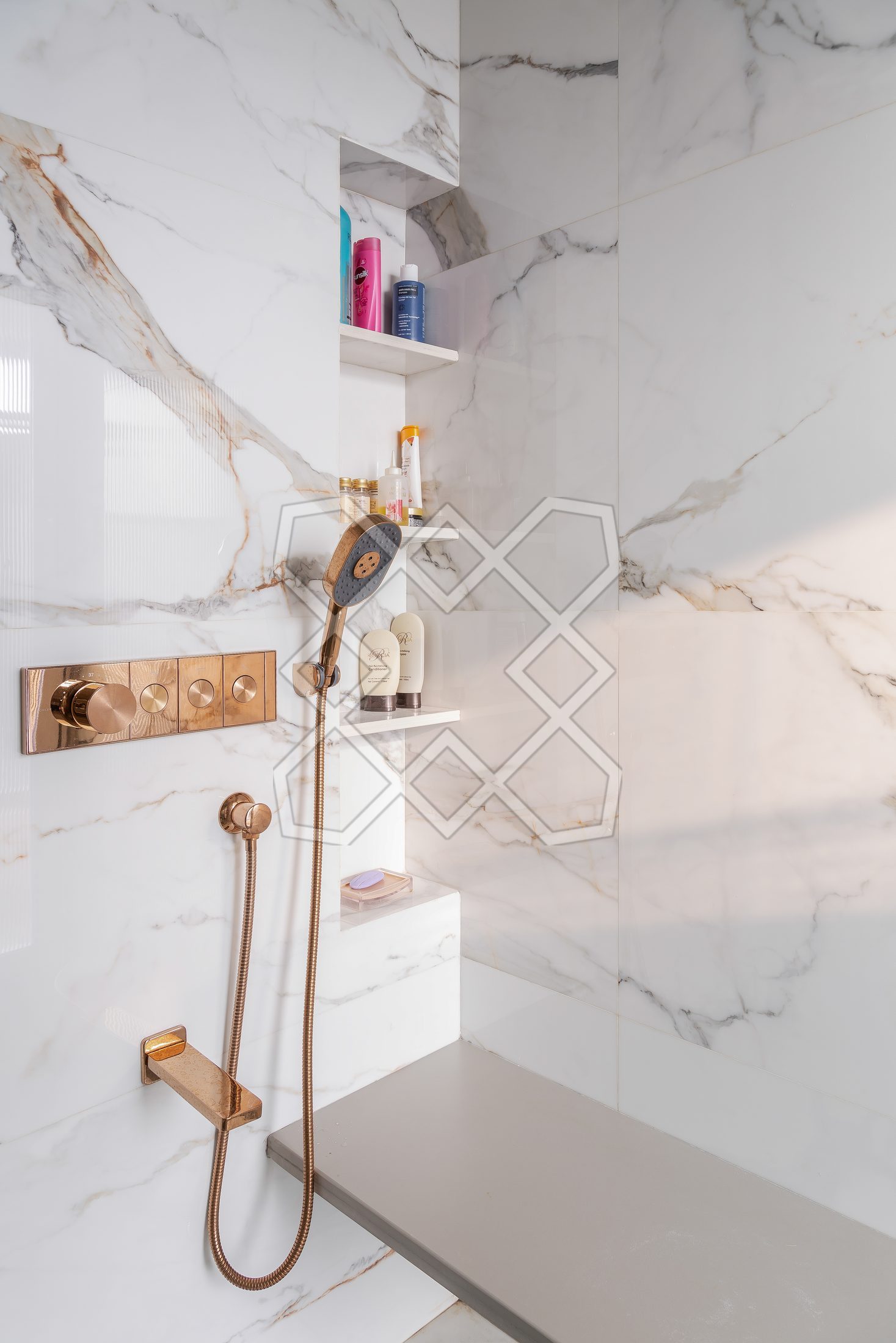 Brass fittings against marble in a bathroom at The Eternal Solace