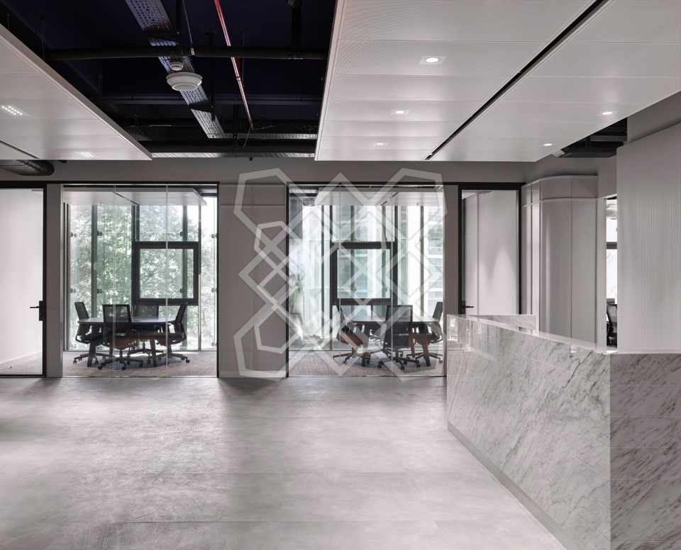The reception at Timeless and Transcendent, looking through to the glazed meeting rooms