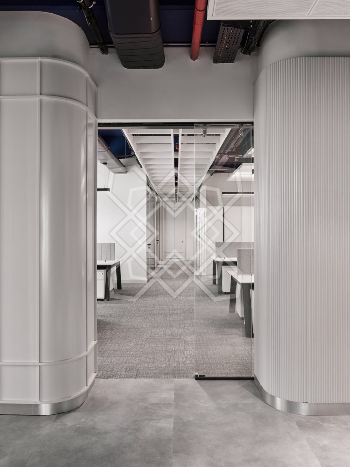 The curved fluted columns at Timeless and Transcendent
