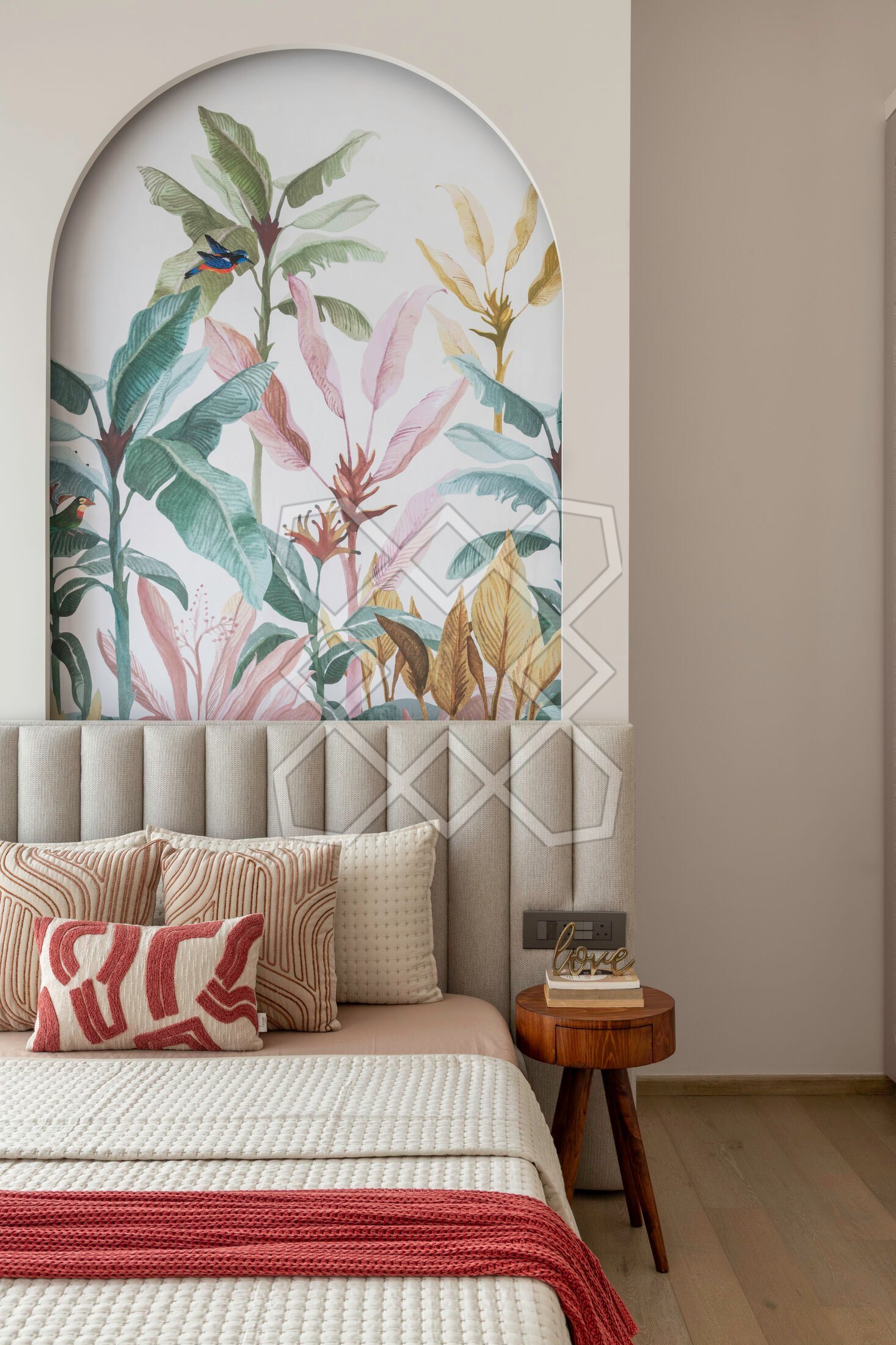 The parents' bedroom at Vyom, with its botanical arch